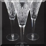 G03. Set of 4 miscellaneous Waterford Crystal Millenium toasting flutes - $100